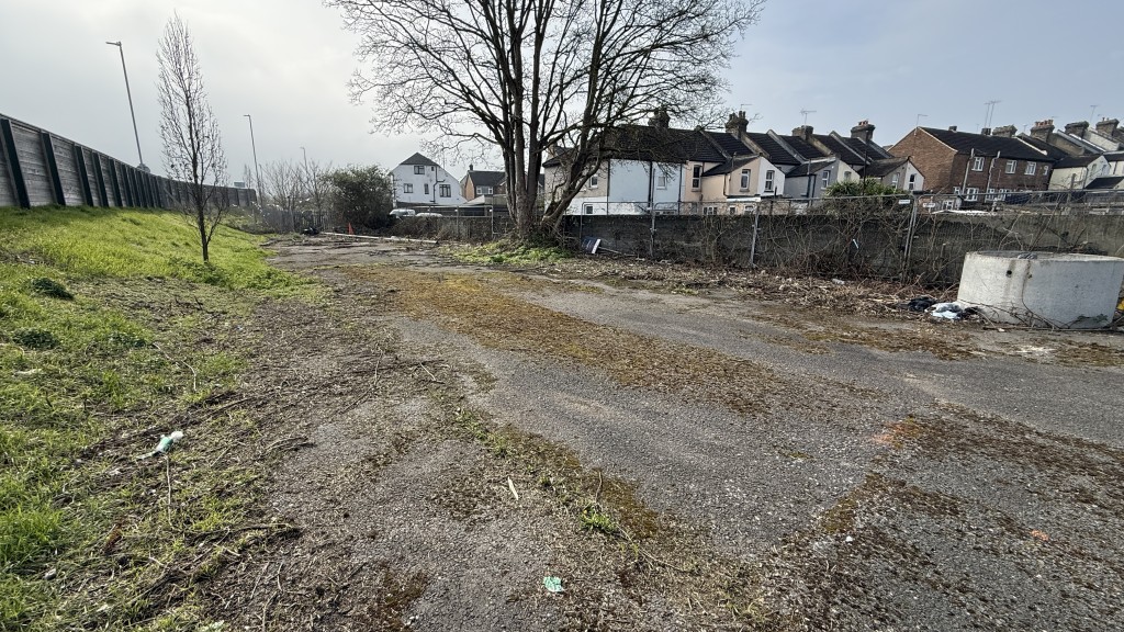 Lot: 24 - OPEN YARD AND LAND OFF KING EDWARD ROAD WITH POTENTIAL - External image of site inside looking south